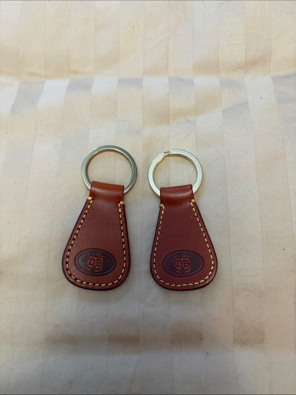 Dooney & Bourke Brown Leather Key Fobs with Contrast Stitching (Pair)